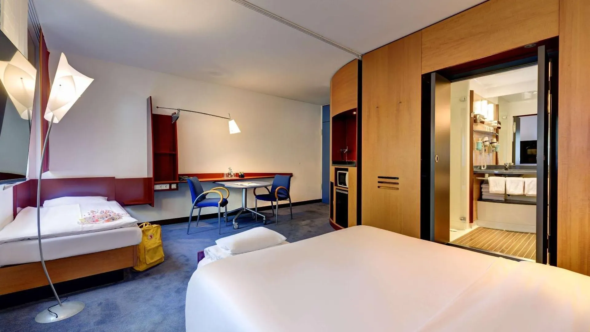 **** Szálloda Novotel Suites Muenchen Parkstadt Schwabing Németország