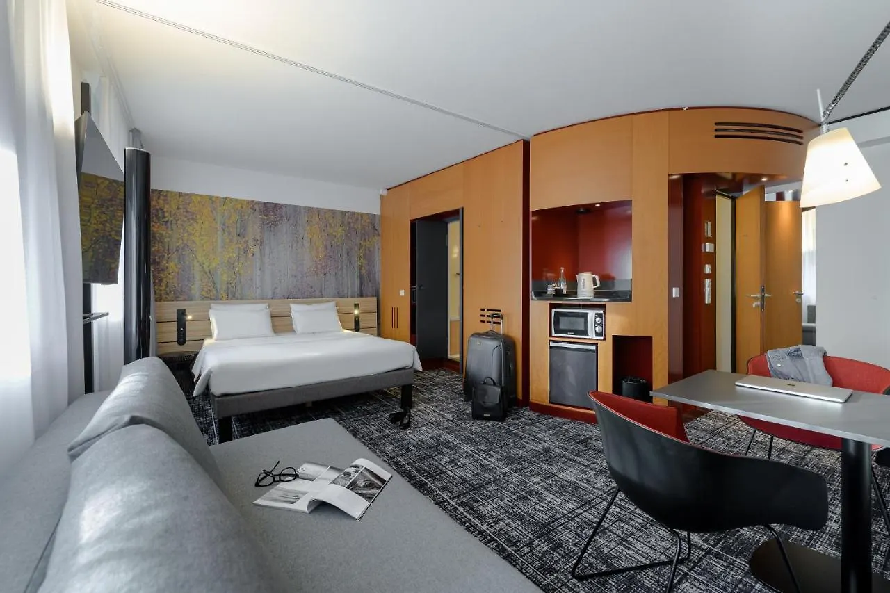 Novotel Suites Muenchen Parkstadt Schwabing Отель Мюнхен